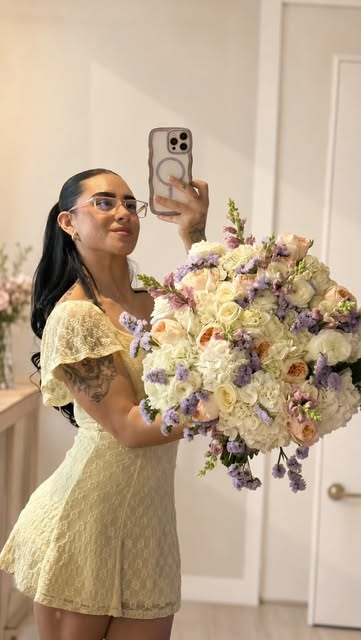 Oversized white hydrangea and rose bouquet